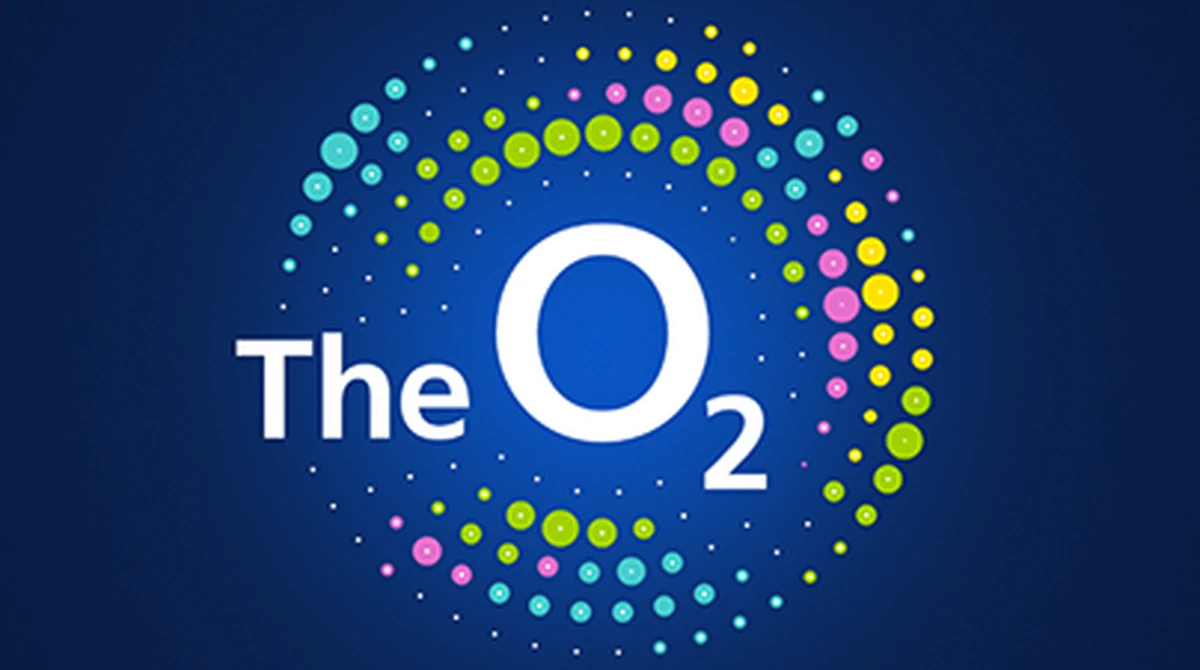 The O2 logo surrounded by colourful dots on a deep blue background